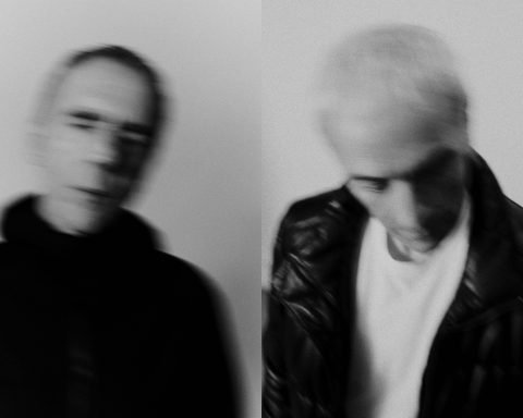 promotional shot of electronic duo Underworld