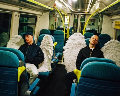 electronic duo Real Lies promotional shot on London Bus