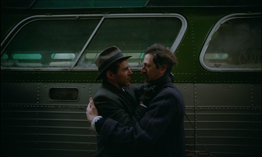 Adrien Brody (right) and Alessandro Nivola (left) in The Brutalist.