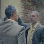 Baxter Dury press shot in front of a mirror